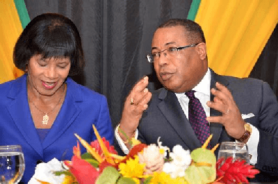 Most Honourable Portia Simpson Miller, Prime Minister of Jamaica speaks with Industry Minister Honourable G. Anthony Hylton  at the launch of the second phase of the National Export Strategy (NES) in Kingston.  The Prime Minister said that she is in full support of the NES and is keen on seeing the development of niche products such as nutraceuticals for export. 